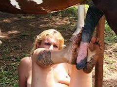 Farmer-maid licks and sucks a horse